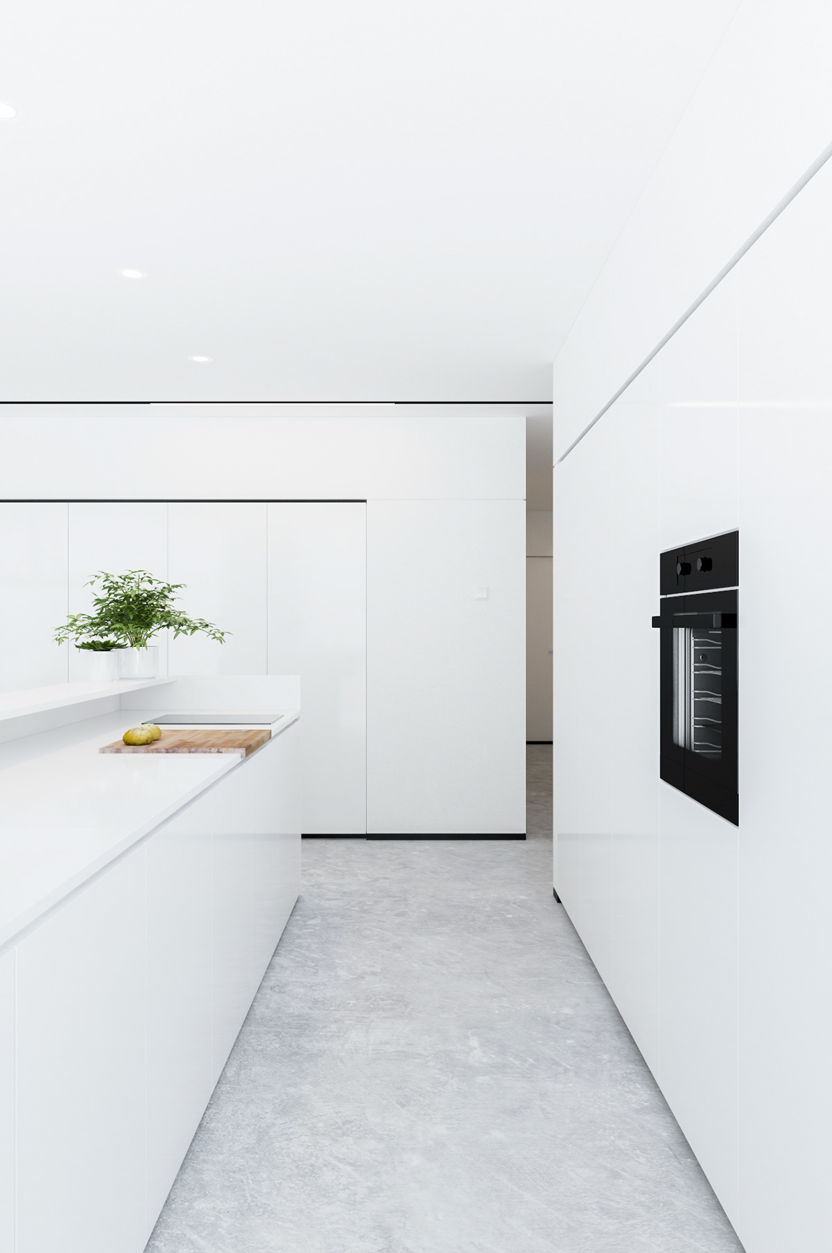 Biała minimalistyczna kuchnia w apartamencie 62m2 z wysoką zabudową, czarnym piekarnikiem i szarą posadzką